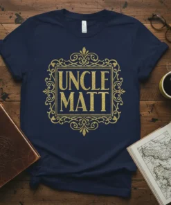 Navy t-shirt with gold glitter text "UNCLE MATT" inside an ornate frame, perfect uncle gift