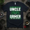 T-shirt with green text "I HAVE TWO TITLES: UNCLE AND GAMER AND I ROCK THEM BOTH" and a video game