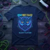 Urban Night Stalker Silent Hunter text above and below a neon cyberpunk owl graphic on a navy blue t-shirt
