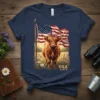 USA Highland Cow Patriotic Graphic Tee featuring a fluffy cow with a bandana and the American flag