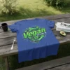 Vegan Just To Annoy You T-Shirt featuring green text and a circular graphic with leaves and a robotic hand holding