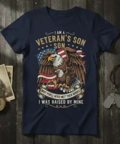 Veteran son t-shirt with "I Was Raised By Mine" text, eagle, and American flag graphic