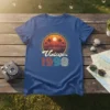 Vintage 1998 t-shirt with a retro sunset design featuring palm trees and the year 1998 in bold colorful text