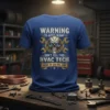 Blue t-shirt with "Warning To Avoid Injury Don't Tell This HVAC Tech How To Do His Job" text and a