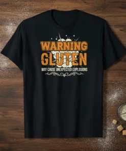 Warning Gluten May Cause Unexpected Explosions text design on a black t-shirt with orange and white distressed lettering and graphic