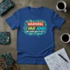 T-shirt with "WARNING I HAVE ADHD AND I KNOW HOW TO USE IT" in bright, tech-inspired font, framed by circuit