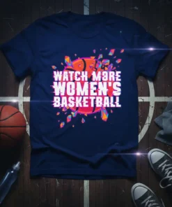 T-shirt with "Watch More Women's Basketball" text and abstract basketball graphic in white and pink