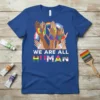 We Are All Human t-shirt design with diverse hands painted in pride flags and text "WE ARE ALL HUMAN"