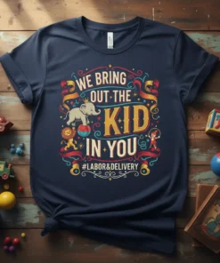 Navy blue t-shirt featuring colorful circus-themed design with text "WE BRING OUT THE KID IN YOU" and "#LABOR&DELIVERY" with elephant