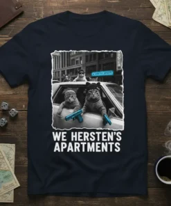 We Hersten's Apartments t-shirt design featuring gangster cats in a car holding blue guns, with urban city background