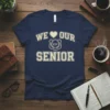 Navy blue t-shirt with "We Love Our Senior XXV" text and a shield graphic, celebrating senior year