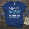 Blue T-Shirt with "In November WE WEAR BLUE Diabetes Awareness Month" text and blue ribbon with wings graphic