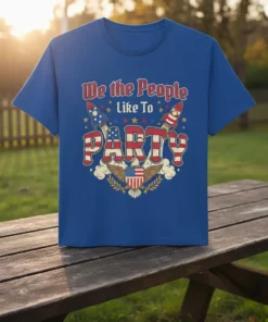 We the People Like To PARTY text with American flag rockets and eagle graphic on a blue t-shirt