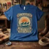 Graphic tee with vintage western design featuring running horses, sun, and the quote "Well I'm Older Now And Still Runnin'