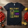 T-shirt with "WELL IT AIN'T GONNA SUCK ITSELF" text and a green crawfish graphic, yellow, green, and purple text