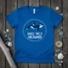 Orca whale with text "WHALE, THIS IS ORCAWARD" inside a circular frame on a royal blue t-shirt