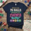 Navy t-shirt with "WHAT HAS 75 BALLS AND KEEPS THE LADIES Smiling? BINGO" text and colorful bingo balls graphic