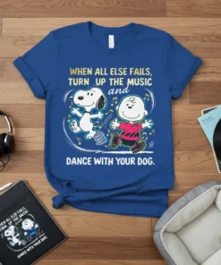 Snoopy and Charlie Brown dancing with musical notes, text reads "When All Else Fails, Turn Up The Music and Dance