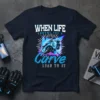 When Life Throws You A Curve Lean To It motorcycle quote t-shirt design with a dynamic image of a rider