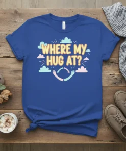 Blue t-shirt with the text "WHERE MY HUG AT?" in yellow and orange, surrounded by clouds and two arms reaching