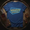 Blue t-shirt with "Whiskey BUSINESS" in a gold and neon blue design, surrounded by whiskey decanter and glasses