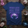 T-shirt with neon text "WHO ATE ALL THE PUSSY?" above a pixelated retro cityscape and moon