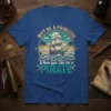 Why Be A Princess When You Can Be A Pirate quote on a blue t-shirt with a pirate ship graphic