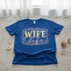 Blue t-shirt with gold and pink "WIFE life" text inside a floral frame