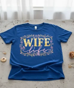 Blue t-shirt with gold and pink "WIFE life" text inside a floral frame