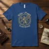 Wild + Proper CLOTHING t-shirt with a vintage griffin emblem and ornate circular design in gold