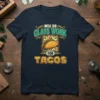 Will Do Glass Work For Tacos t-shirt with taco graphic and stained glass art style, featuring colorful text