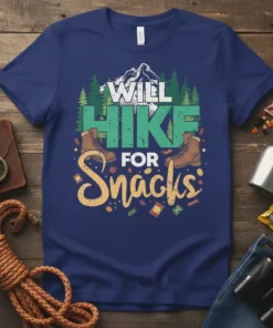 Will Hike For Snacks t-shirt with hiking boots, mountains, and pine trees graphic