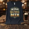 Wish You Were Beer text with hops and beer mug graphic on a navy blue t-shirt
