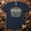 Wood Whisperer T-Shirt design featuring rustic typography and woodworking tools graphic on navy blue fabric