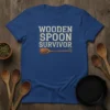 Wooden Spoon Survivor text with a graphic of a wooden spoon on a blue t-shirt