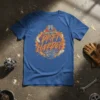 Work Hard Drift Harder text design with piston and tire graphic on a blue t-shirt