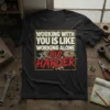 Black t-shirt with "Working With You Is Like Working Alone But Harder" quote in distressed yellow and red typography, featuring