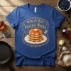 World's Best Pancake Maker text with a stack of pancakes graphic on a blue t-shirt