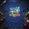 World's Okayest Bowler text design with bowling pins and colorful abstract shapes on a navy blue t-shirt