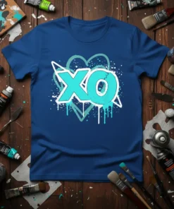 Blue t-shirt with large aqua "XO" graphic, surrounded by hearts and splattered paint effect