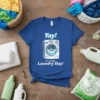 Yay! It's Finally Laundry Day! t-shirt with a smiling washing machine graphic and bold text