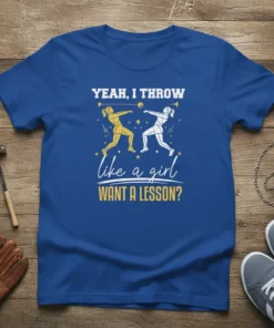 YEAH, I THROW like a girl WANT A LESSON? quote on a blue t-shirt with graphics of two female athletes