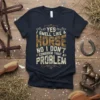 Dark t-shirt with text "YES I SMELL LIKE A HORSE NO I DON'T CONSIDER THAT A PROBLEM" in distressed vintage