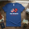 Blue t-shirt featuring shields with the USA and Trinidad flags and the text "YES I'M BOTH of them"