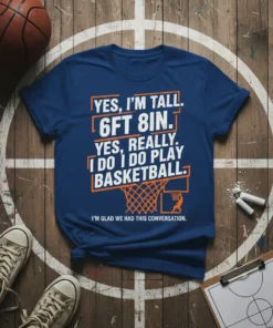Navy t-shirt with white text: "YES, I'M TALL. 6FT 8IN. YES, REALLY. I DO I DO PLAY BASKETBALL." and a