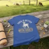 Blue t-shirt with "Yoga Is Better With Goats" text and a graphic of a goat wearing a flower crown