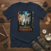 Yosemite National Park vintage travel poster design featuring a waterfall, trees, and camping scene on a navy t-shirt