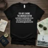 Black t-shirt with "YOU ARE LEAVING THE AMERICAN SECTOR" in English, Russian, French, and German, plus "U.S. ARMY" text