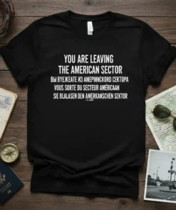 Black t-shirt with "YOU ARE LEAVING THE AMERICAN SECTOR" in English, Russian, French, and German, plus "U.S. ARMY" text
