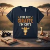 Navy blue t-shirt with "YOU BET GIRAFFE I'M CUTE" text and a cartoon giraffe graphic